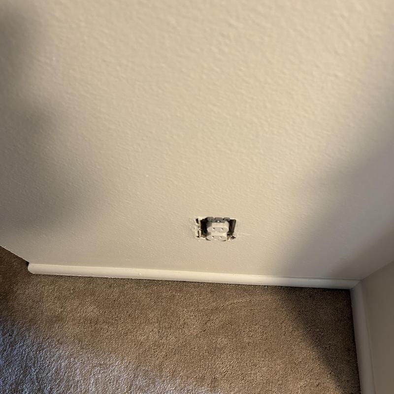 Electrical receptacle missing cover plate on wall Electrical receptacle missing cover plate on wall