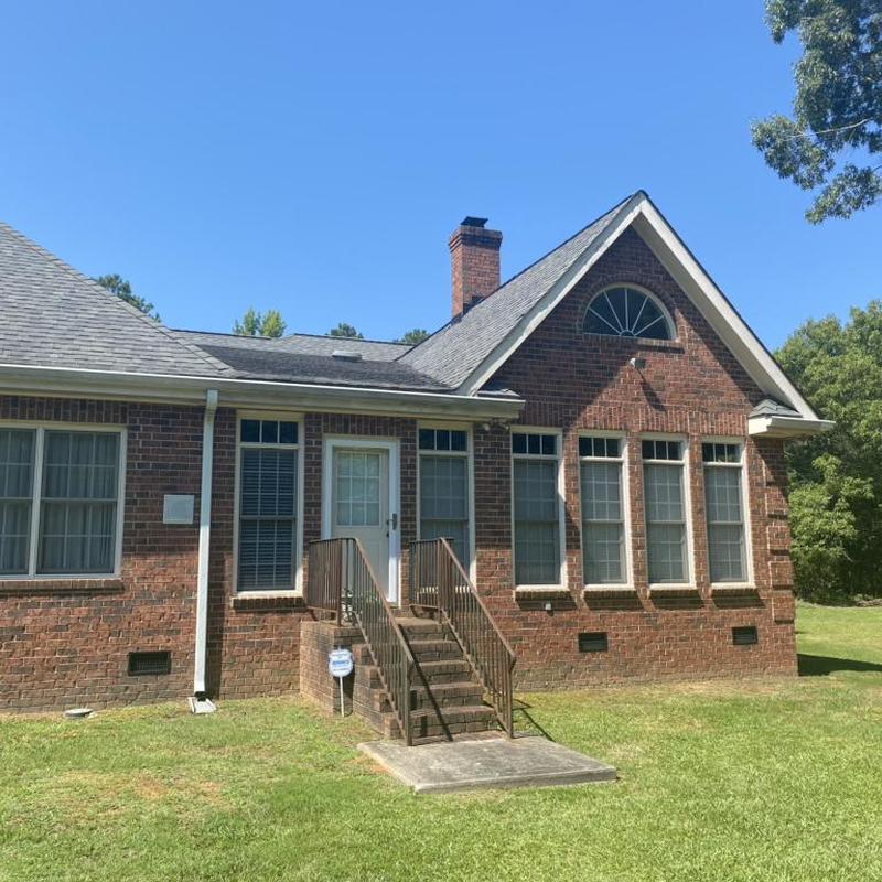 Asphalt shingle roof with hail and wind damage inspection