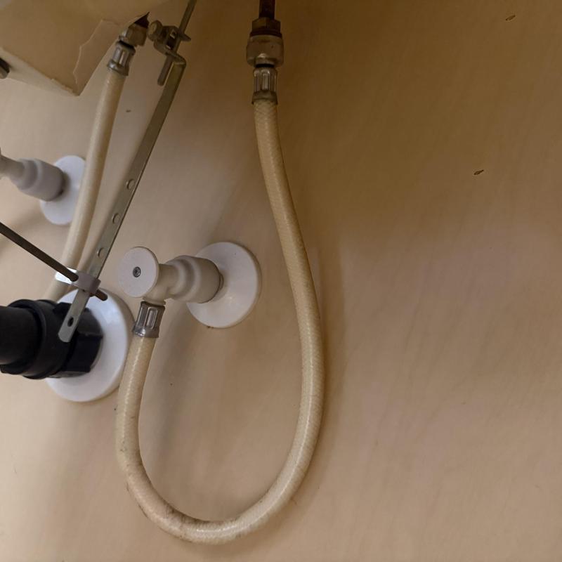 Lavatory faucet supply lines installation under sink