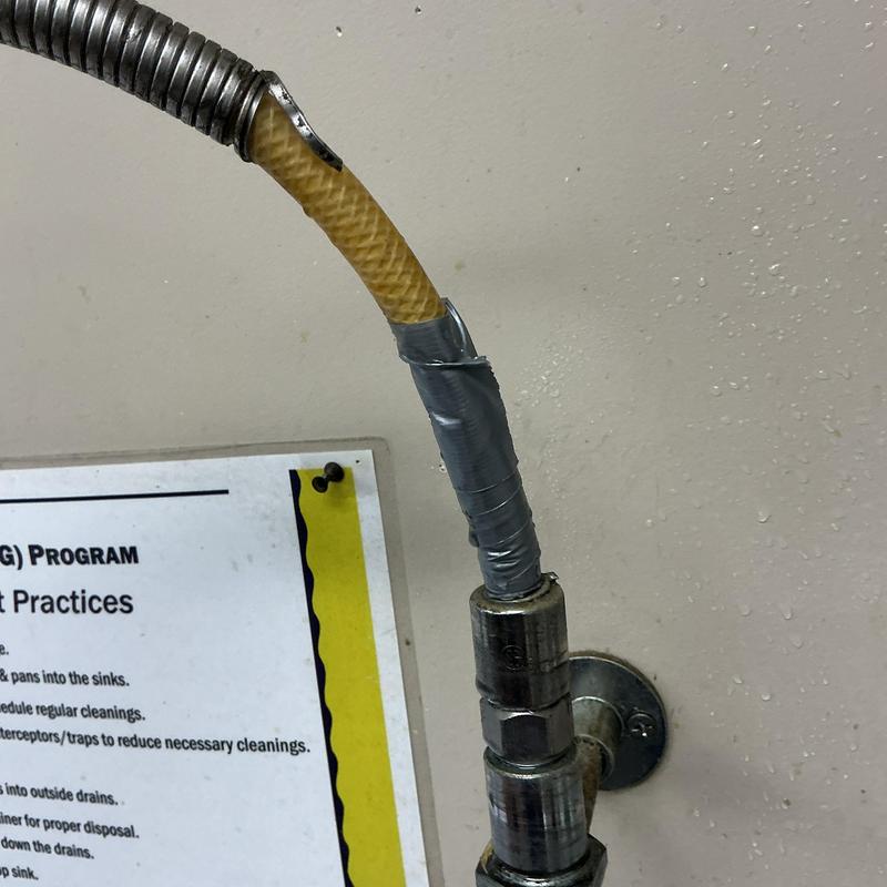 T&S brass faucet supply hose with duct tape repair T&S brass faucet supply hose with duct tape repair