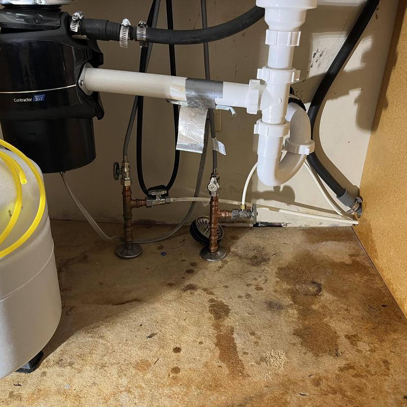 Reverse osmosis system water line under sink installation