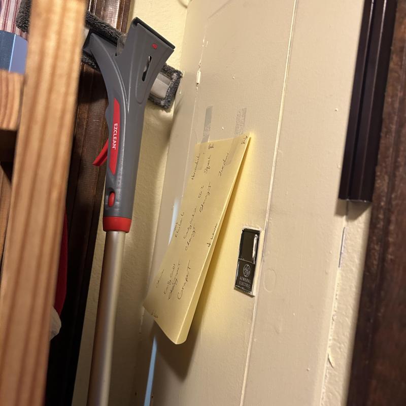 Water heater thermostat with handwritten service note Water heater thermostat with handwritten service note