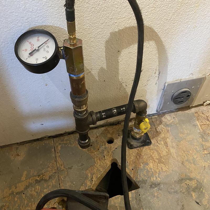 Gas stove line with pressure gauge testing setup Gas stove line with pressure gauge testing setup