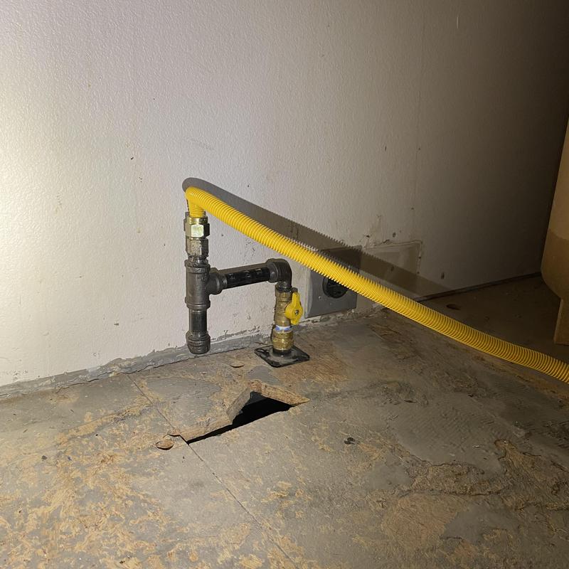 Gas stove piping with shutoff valves and yellow flex line Gas stove piping with shutoff valves and yellow flex line