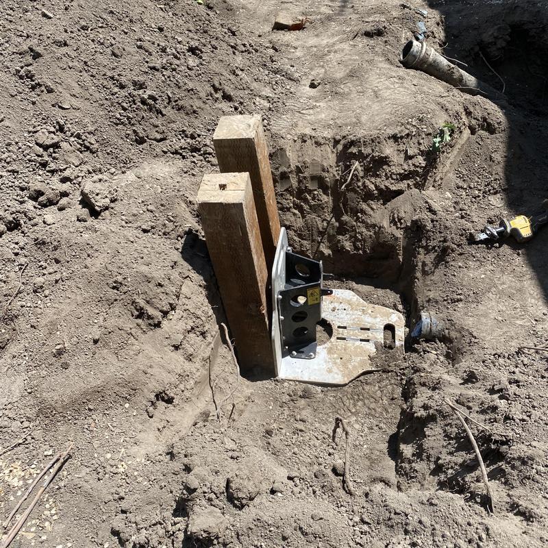 Building sewer pipe excavation with support braces Building sewer pipe excavation with support braces