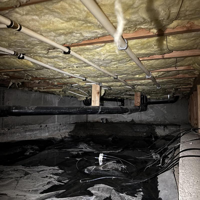PVC drain pipes and PEX water supply lines in crawlspace PVC drain pipes and PEX water supply lines in crawlspace