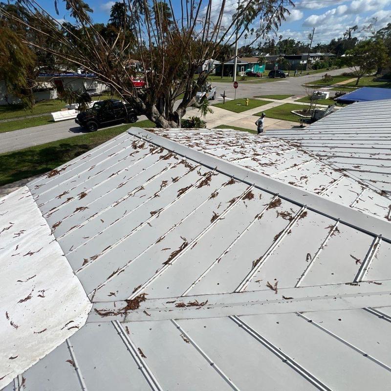 Metal roof panels with debris after inspection in Florida Metal roof panels with debris after inspection in Florida