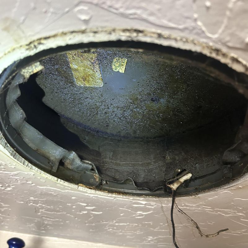 Kitchen exhaust fan housing with loose wiring Kitchen exhaust fan housing with loose wiring