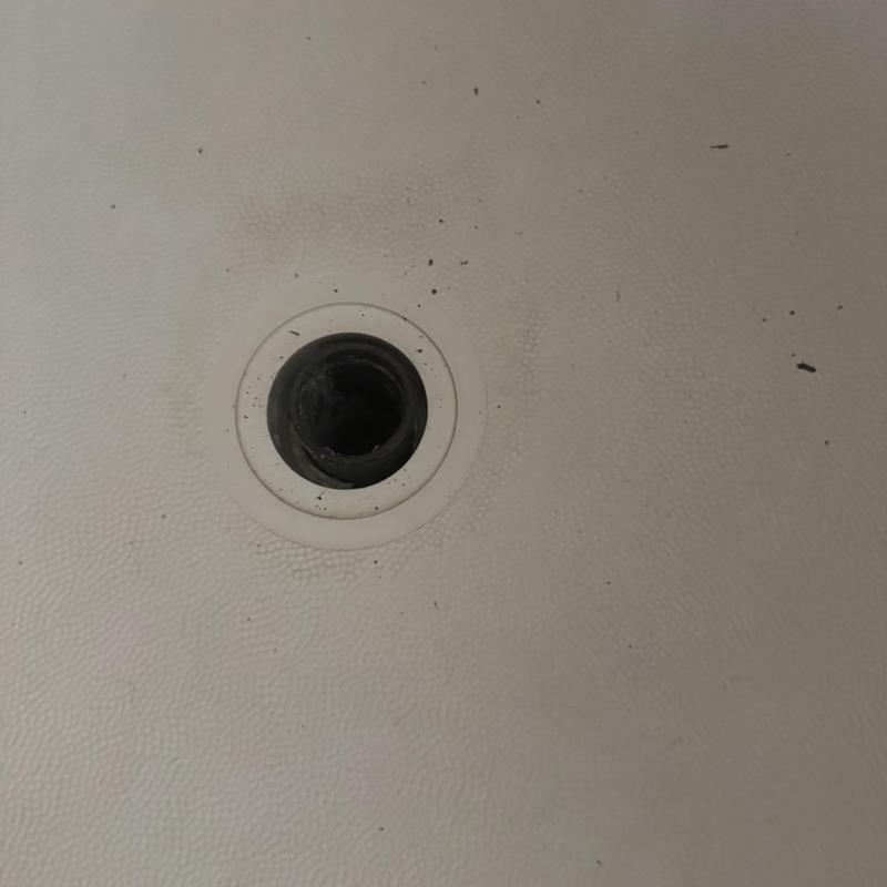 Shower drain replacement in textured shower base