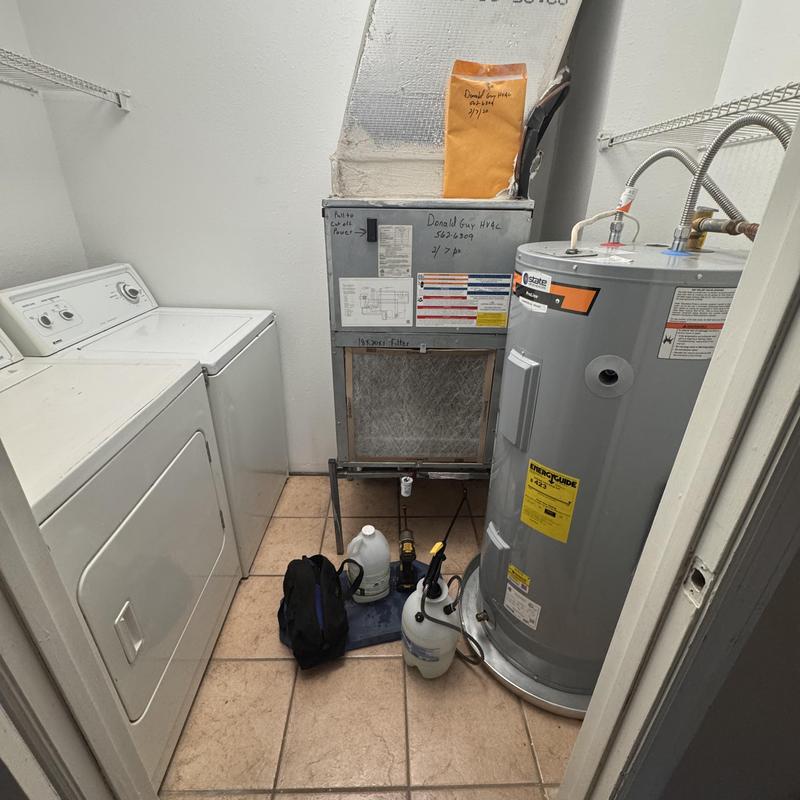 Water heater and furnace maintenance setup in laundry room