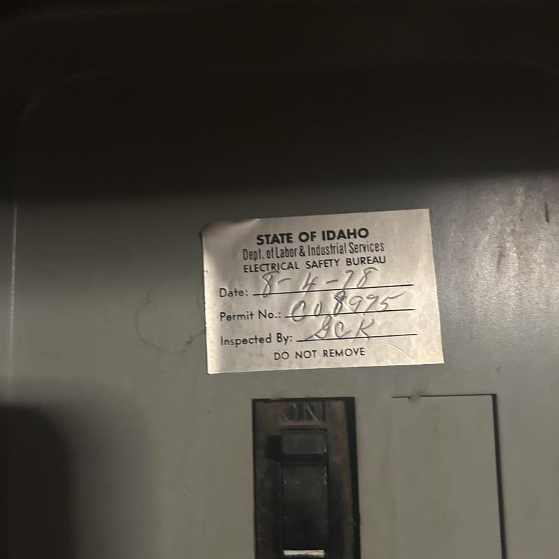 Electrical service panel with Idaho inspection sticker Electrical service panel with Idaho inspection sticker
