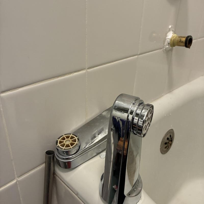 Tub spout diverter removed from bathtub faucet assembly