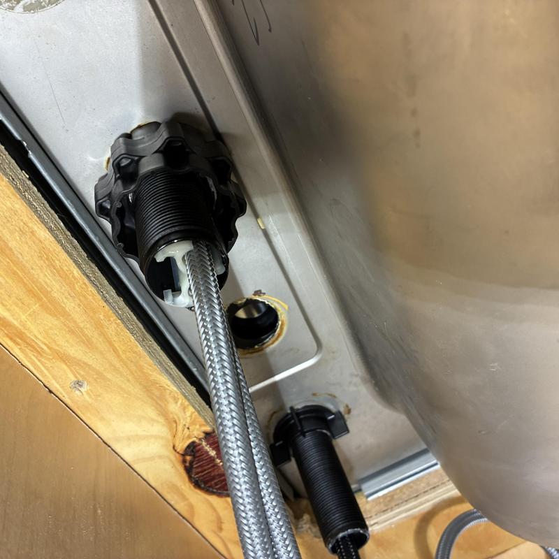 Utility sink faucet braided hose connection under sink