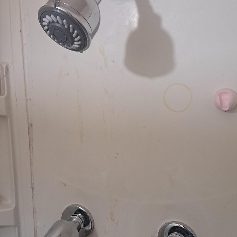 Two-handle shower valve with showerhead in tub area Two-handle shower valve with showerhead in tub area