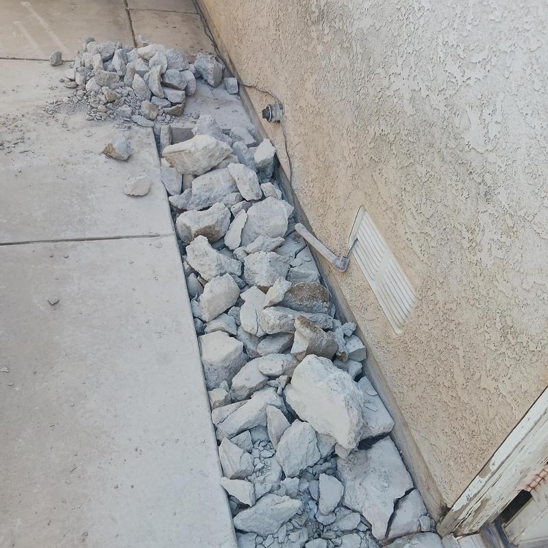 Sewer line wye fitting trench with broken concrete in Lancaster