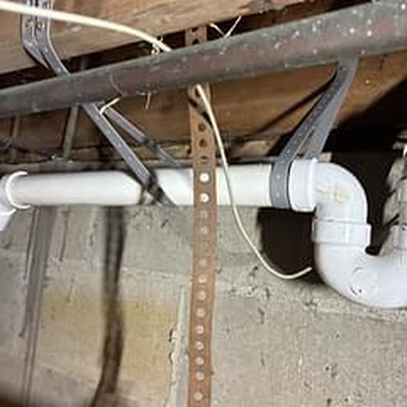 Laundry drain pipe with new boiler drains in crawl space