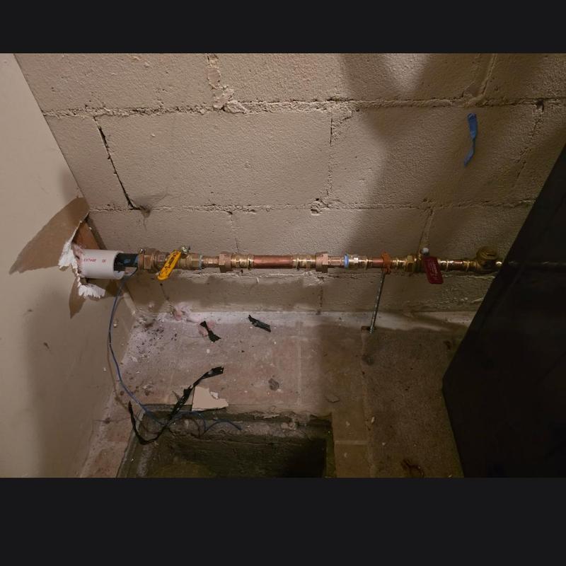 Water service pipe with valves and tracer wire installation