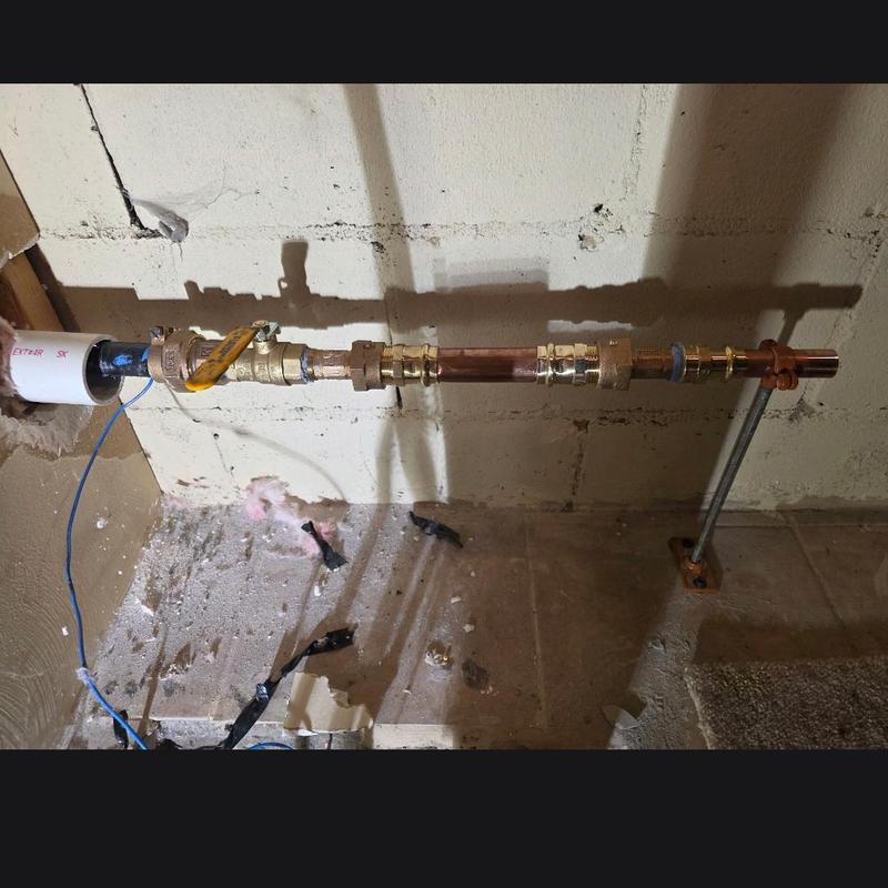 Copper water service pipe with valve and tracer wire installation