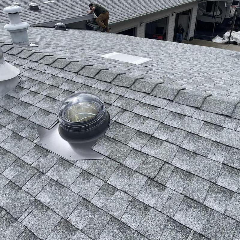 GAF asphalt shingle roof with roof vent installation