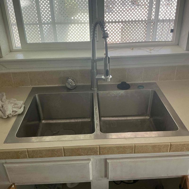 Top-mount double kitchen sink with pull-down faucet installation