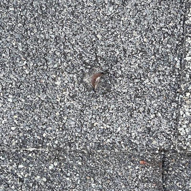 Torch down roofing with embedded gravel surface
