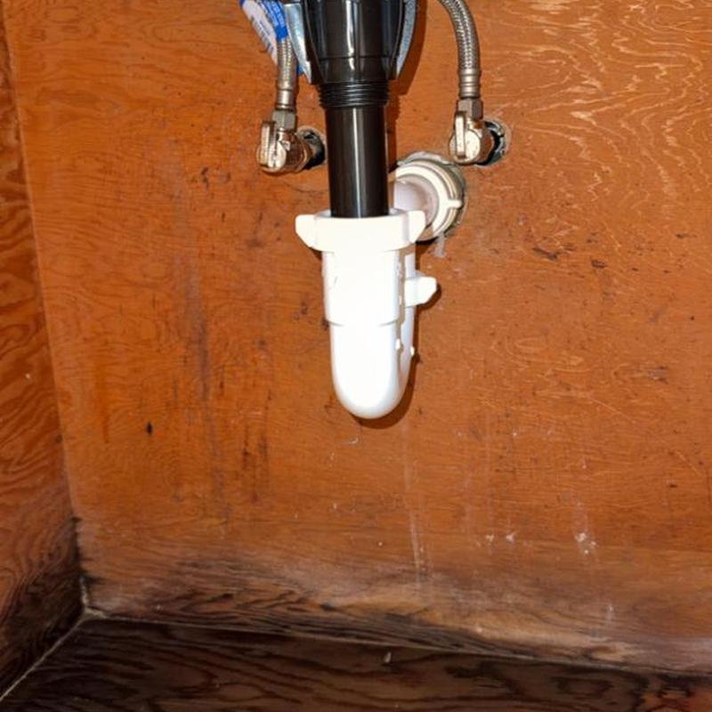 Bathroom sink drain pipe with leak repair