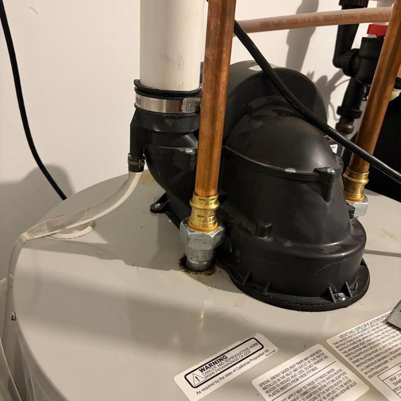 Water heater with new hot and cold nipples installed