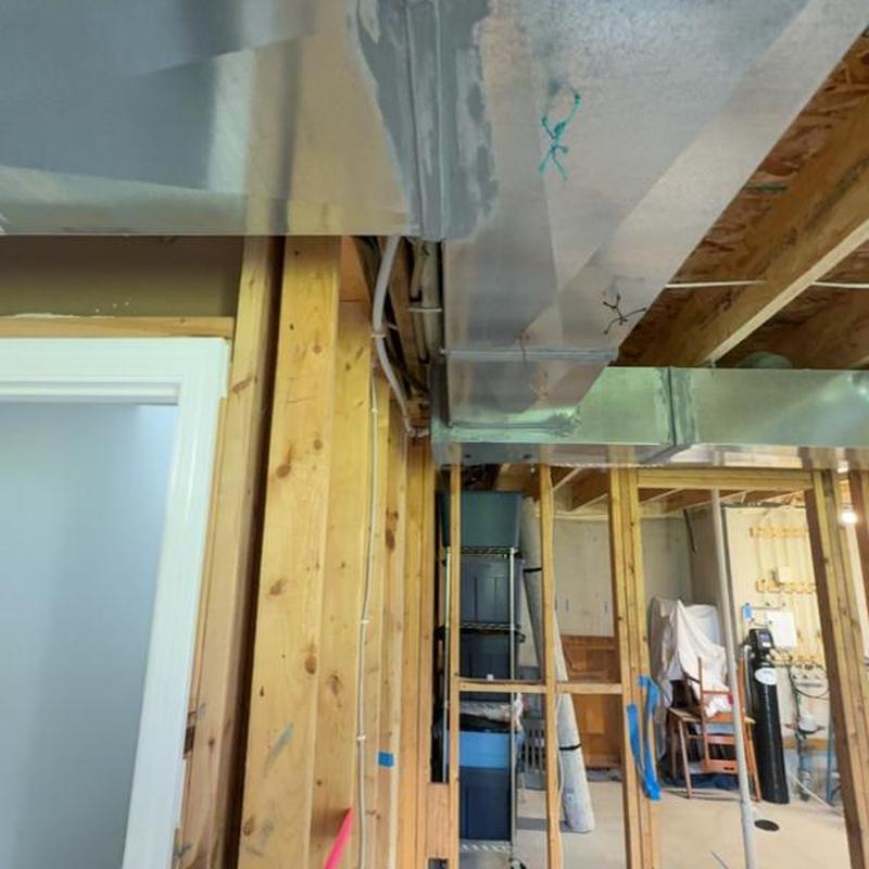 Ductwork installation in basement framing