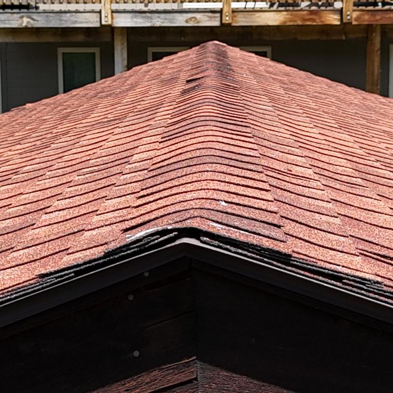 Asphalt shingle roof ridge with laminate Class A shingles