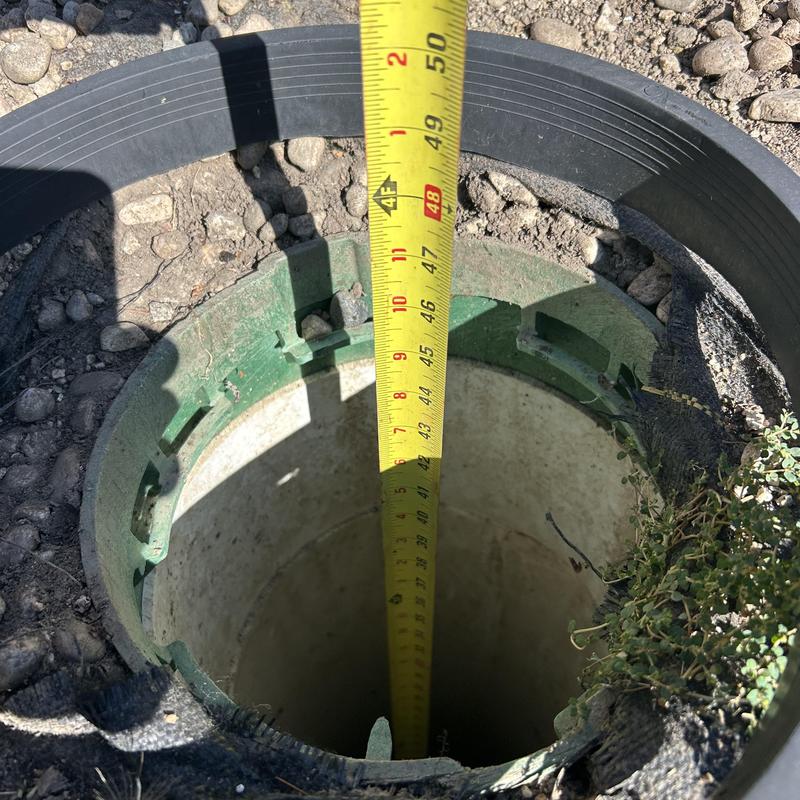 Irrigation valve box with measuring tape inside Irrigation valve box with measuring tape inside