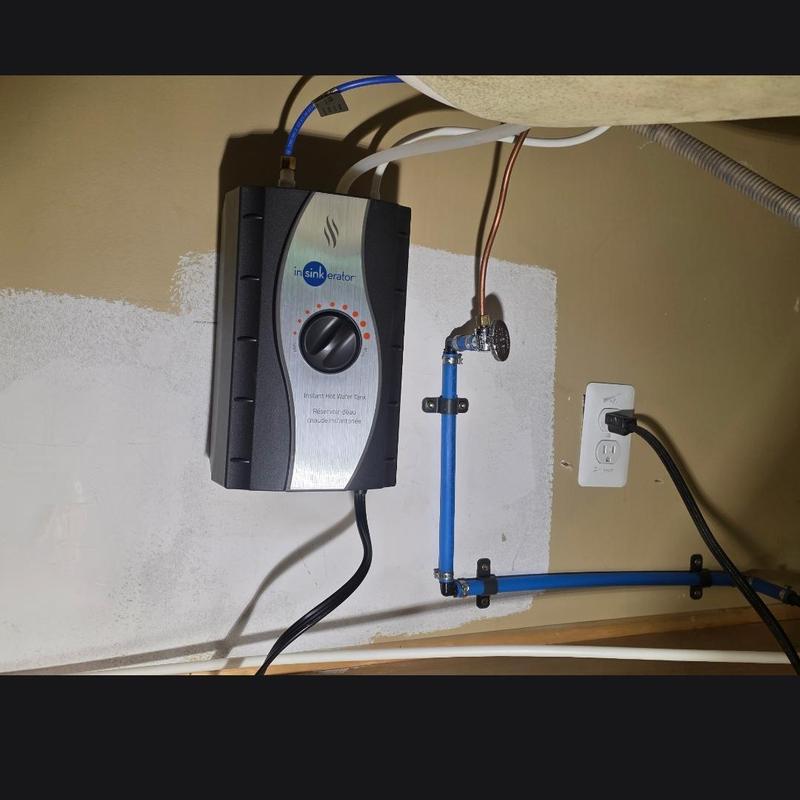 Instant hot water tank with plumbing and electrical hookup Instant hot water tank with plumbing and electrical hookup