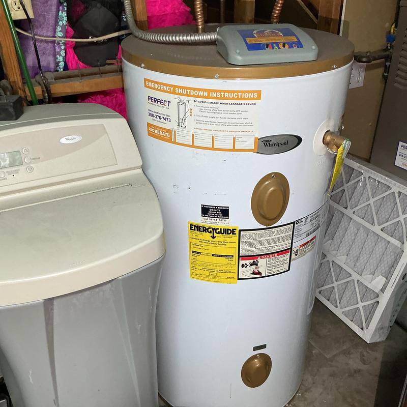 Water heater with emergency shutdown and energy guide labels Water heater with emergency shutdown and energy guide labels