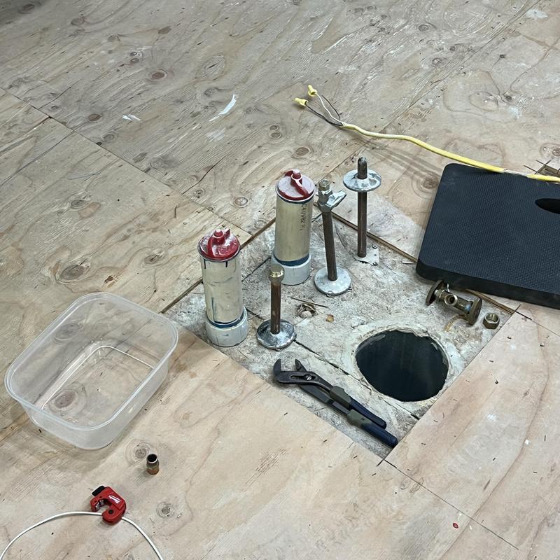 Toilet flange and supply lines installation on plywood floor Toilet flange and supply lines installation on plywood floor