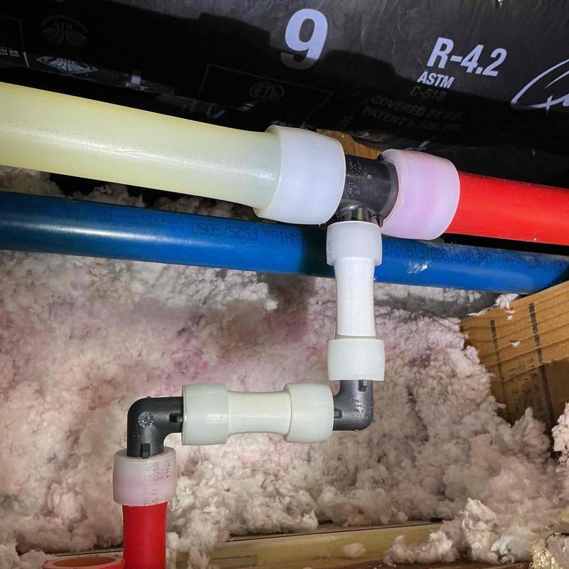 1-inch and 1/2-inch water piping with fittings installation