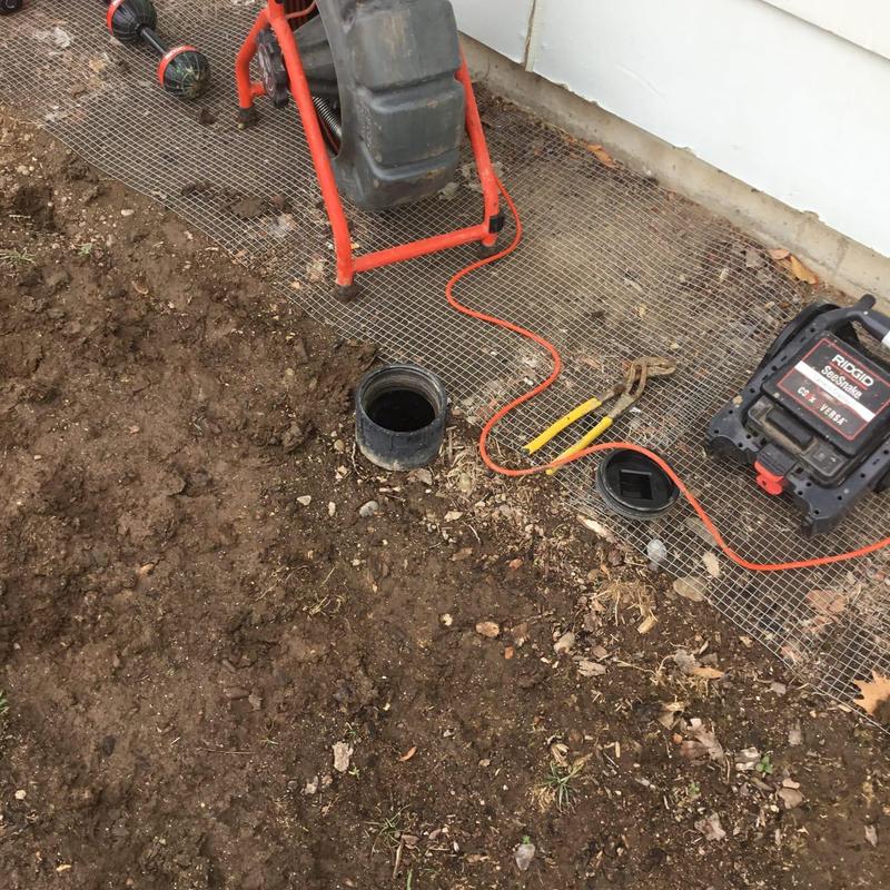 Sewer camera inspection setup with tools and open pipe Sewer camera inspection setup with tools and open pipe