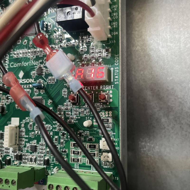 HVAC control board with status code A16 displayed HVAC control board with status code A16 displayed