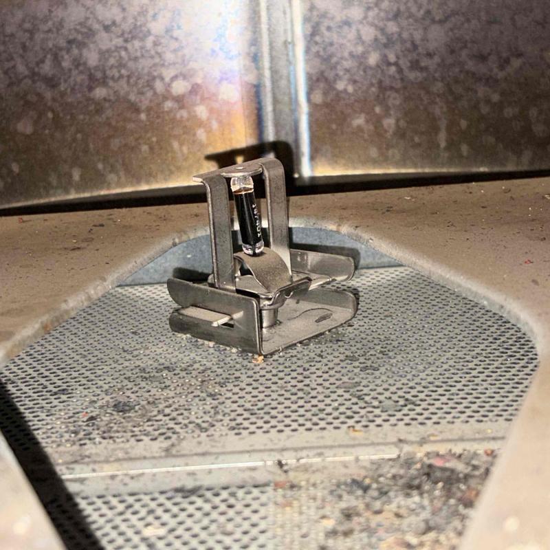 Thermocouple sensor on water heater burner assembly Thermocouple sensor on water heater burner assembly