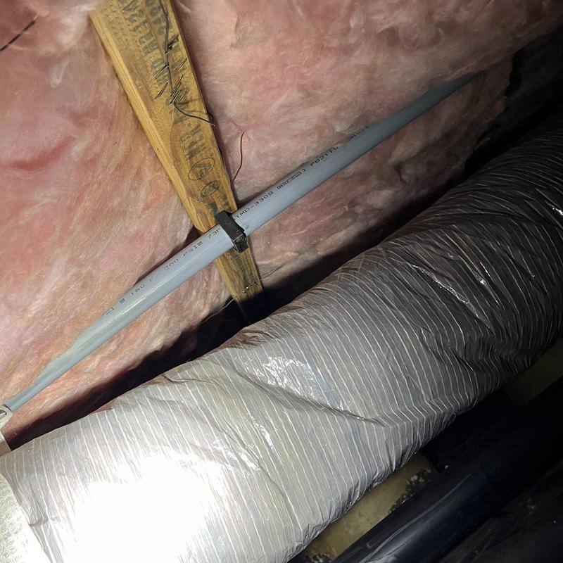 Polybutylene water piping with attic insulation and ductwork Polybutylene water piping with attic insulation and ductwork