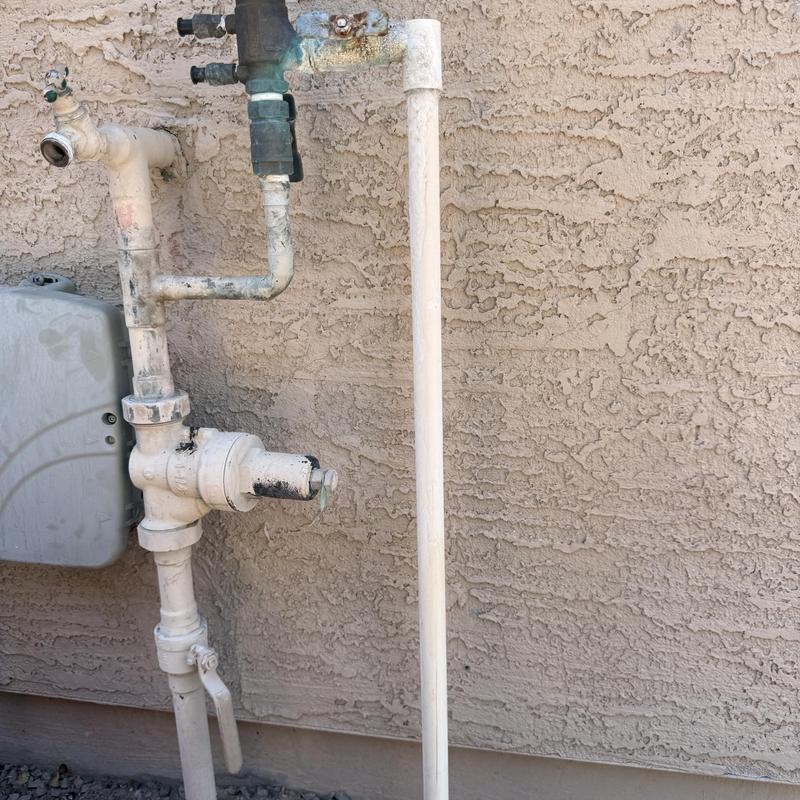 Outdoor hose bib water line with valve and fittings
