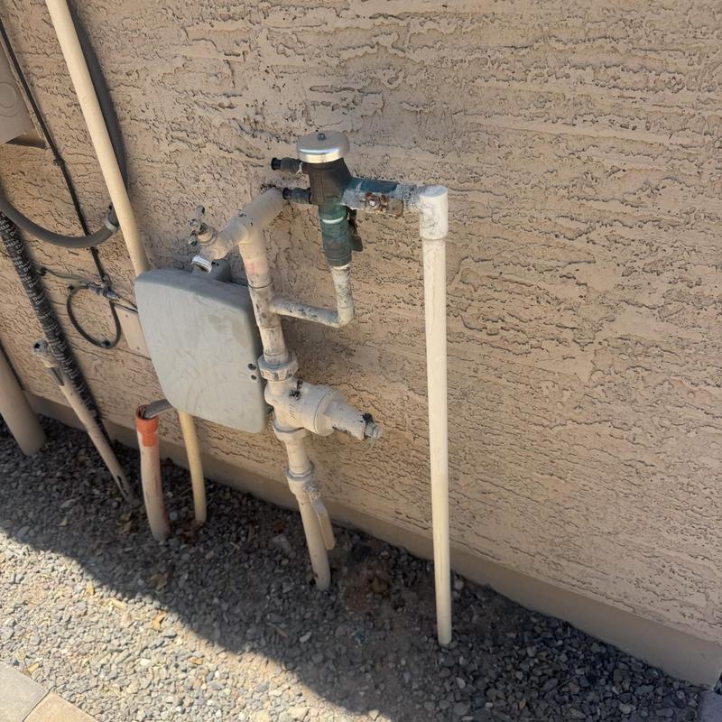Outdoor hose bib with water line repair on wall