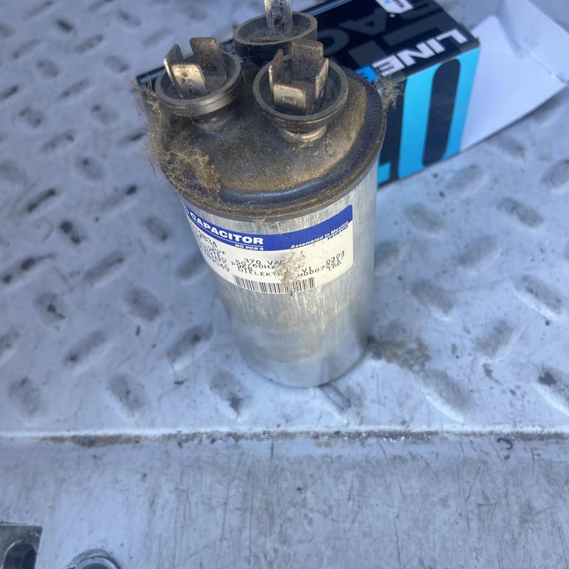 HVAC capacitor with dirt and wear on surface HVAC capacitor with dirt and wear on surface