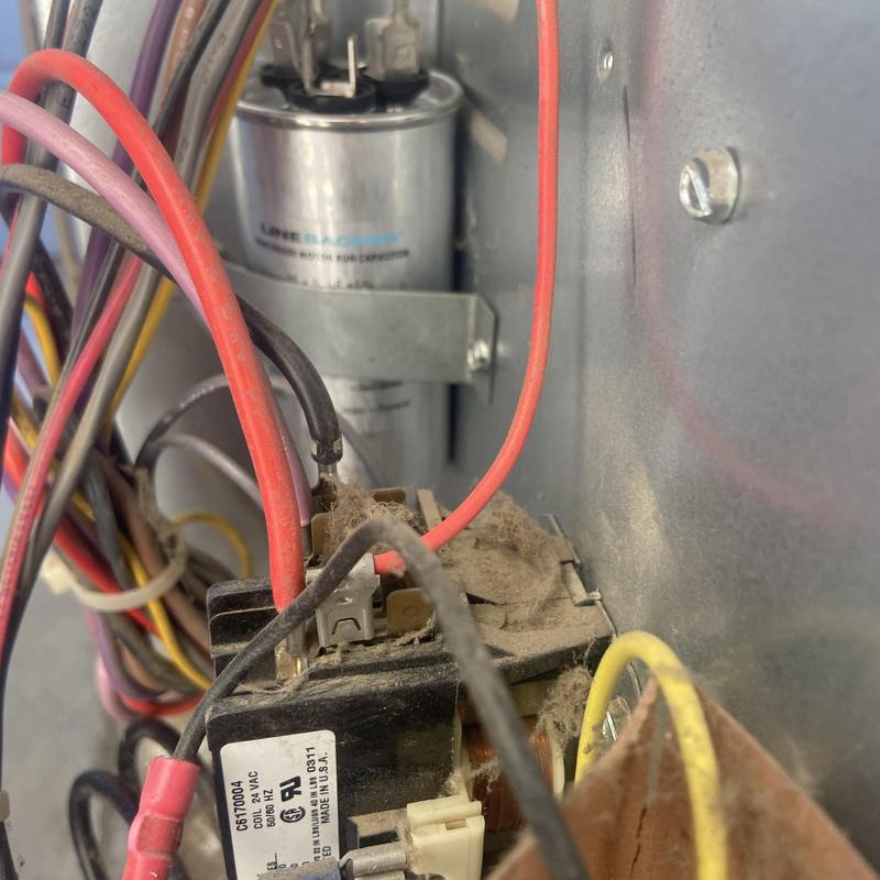 HVAC capacitor with dusty wiring and metal components HVAC capacitor with dusty wiring and metal components
