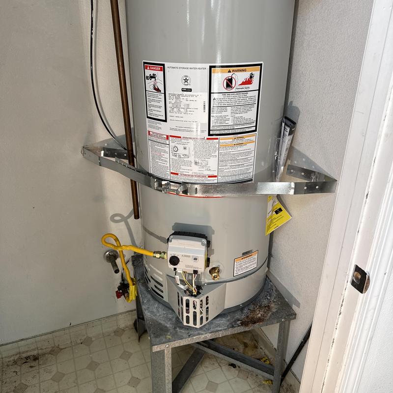 50-gallon water heater with new supply lines installed