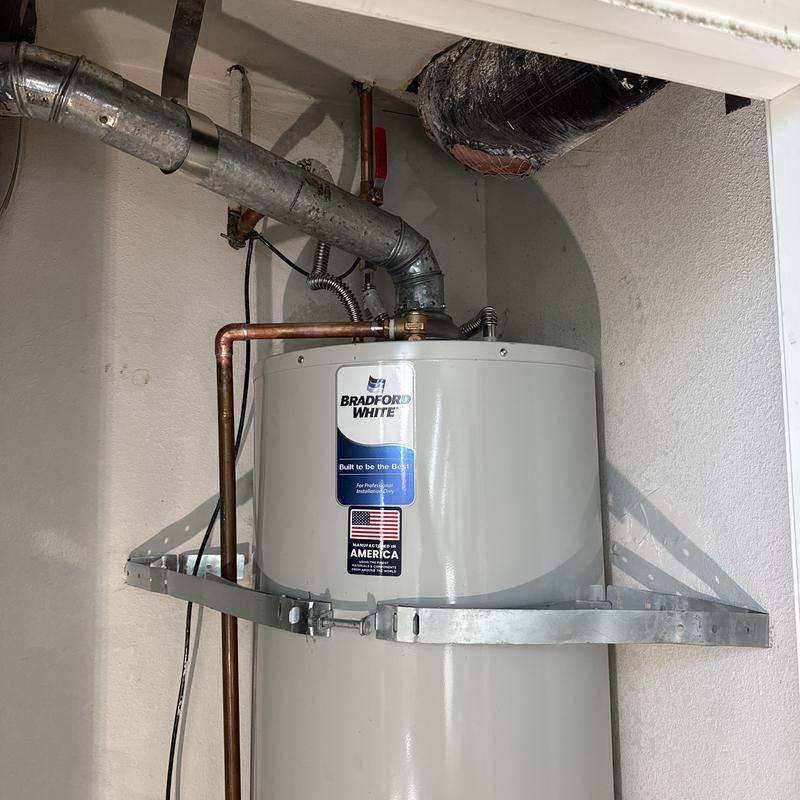 50-gallon water heater with new supply lines installed