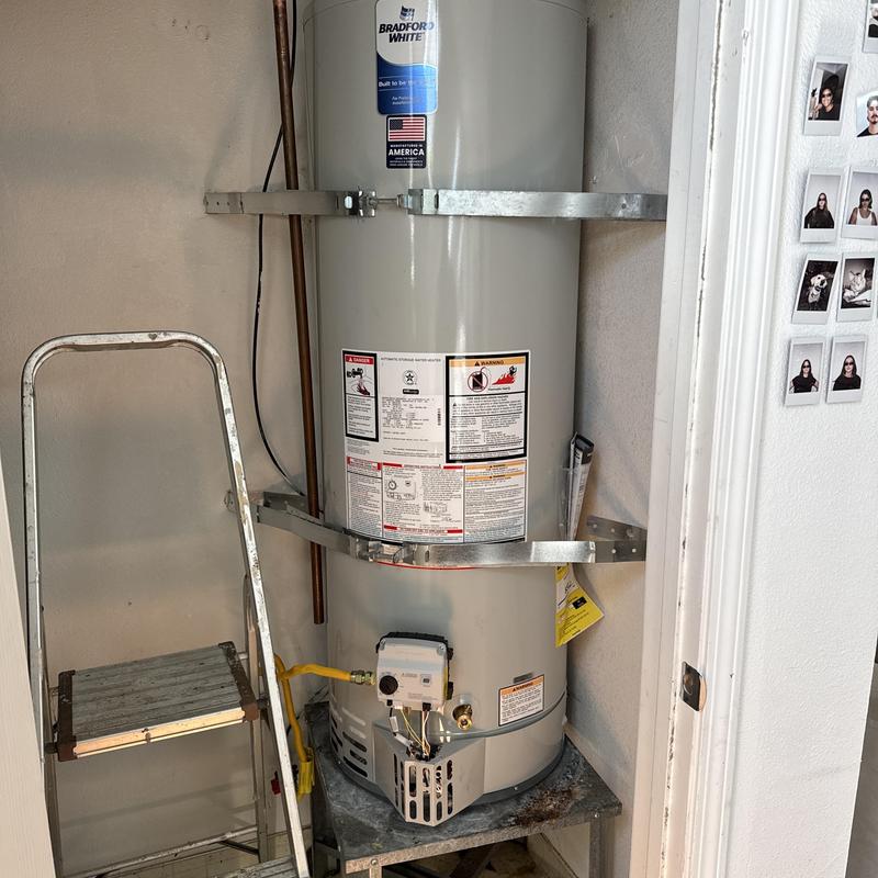 50-gallon water heater with new supply lines installed