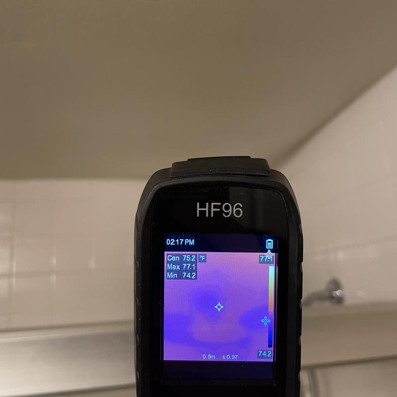 Thermal imaging camera leak detection on bathroom tile wall