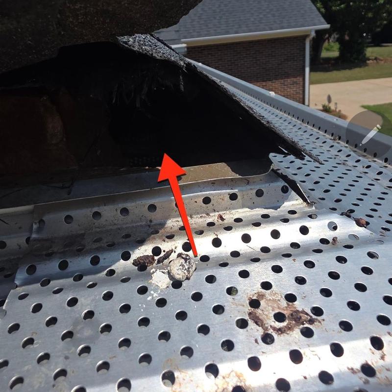 Ridge shingle damage with metal ridge vent installation