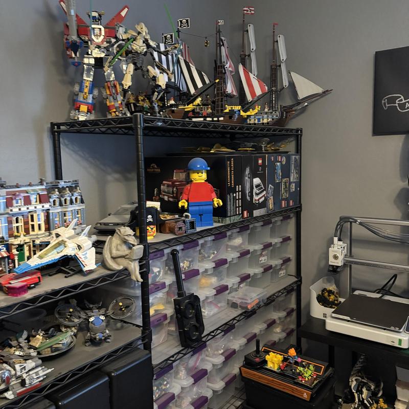 Toy shelf with LEGO sets and collectibles storage