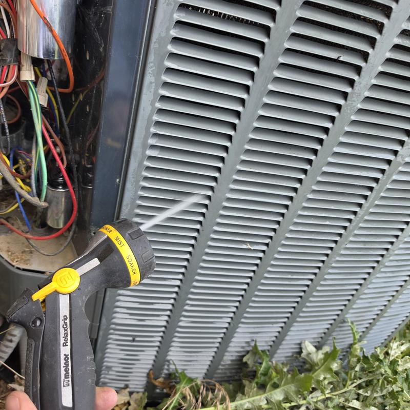Trane air conditioner condenser coils being cleaned