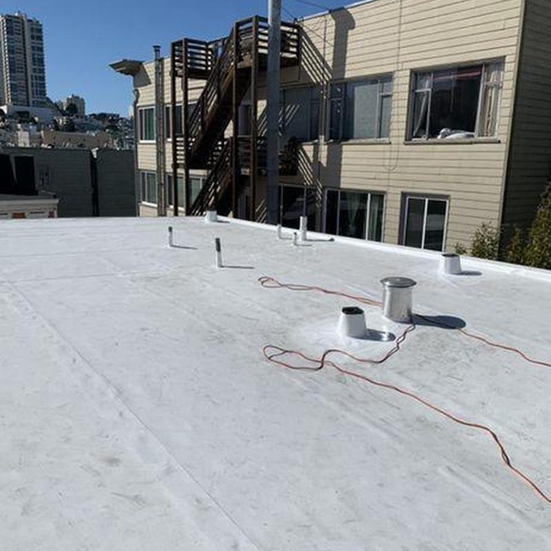 Flat roof membrane with ventilation pipes and wiring Flat roof membrane with ventilation pipes and wiring